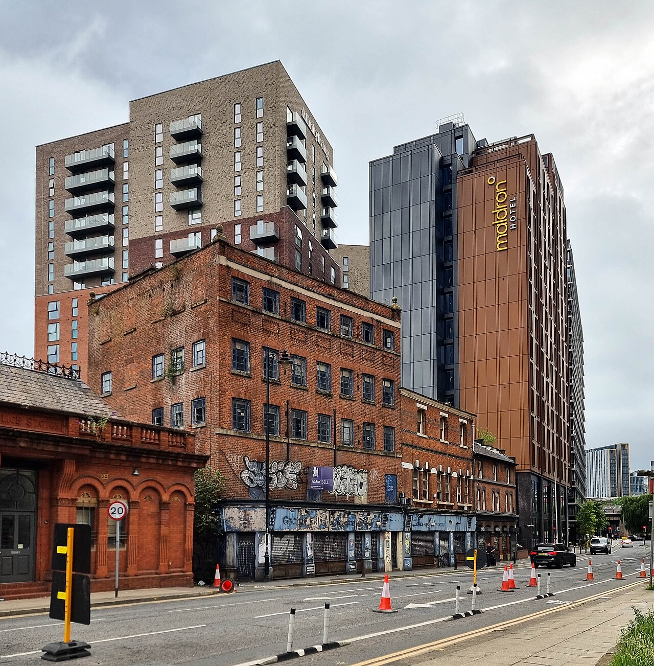 Historic and modern buildings on Chapel Street in Salford